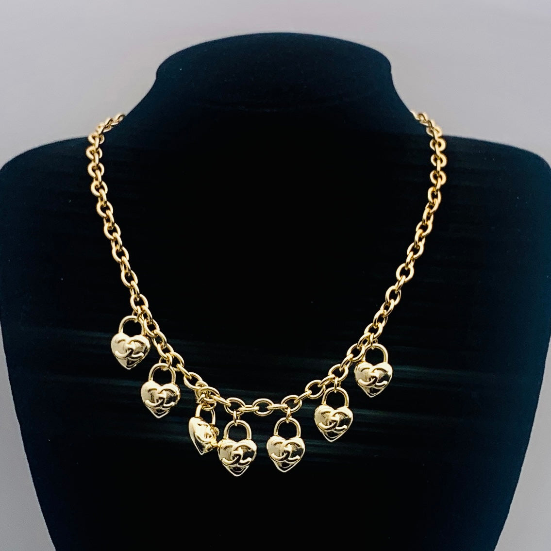 CC TURNLOCK HEART CHARM NECKLACE