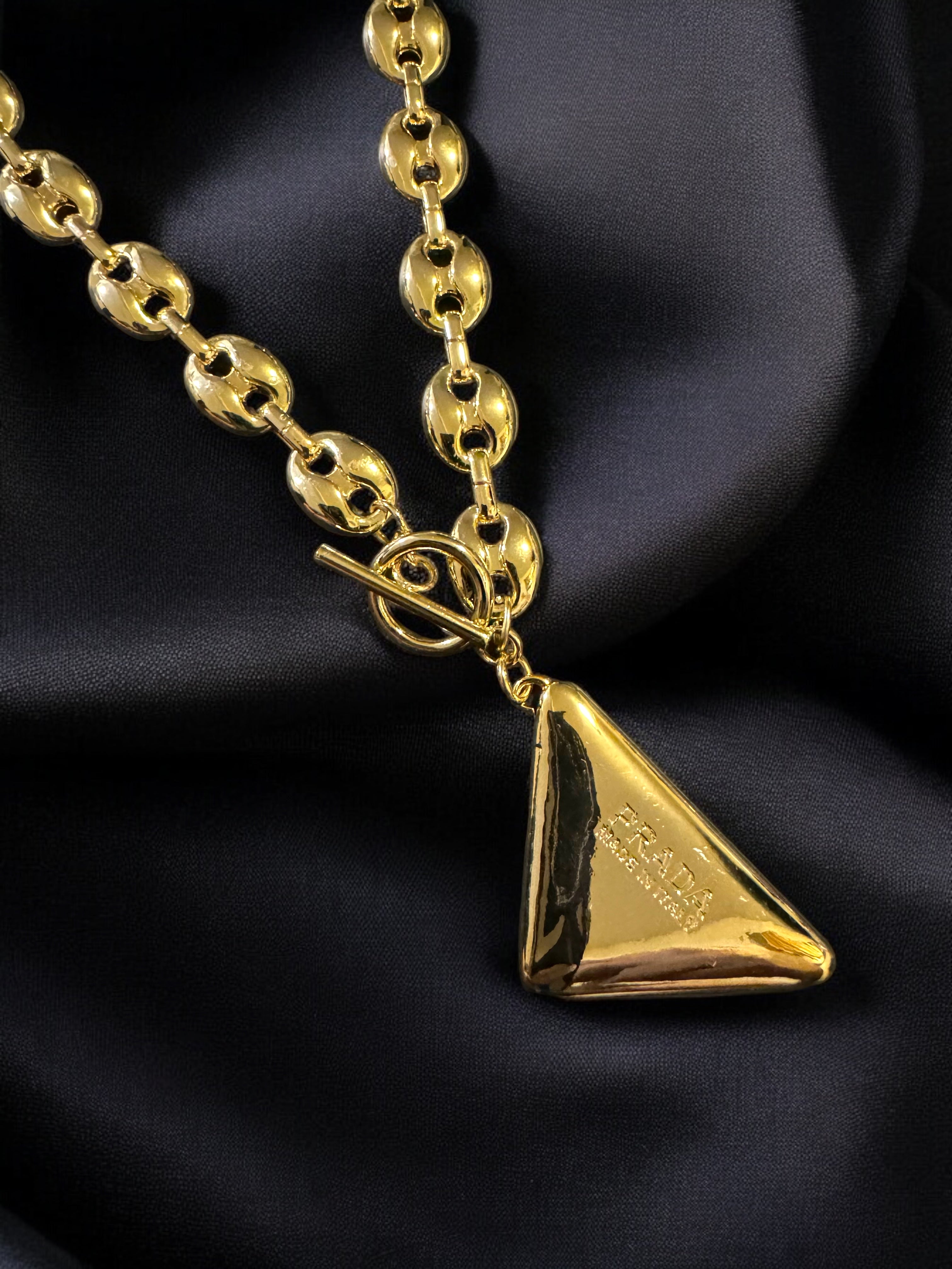 REPURPOSED PRADA TRIANGLE NECKLACE